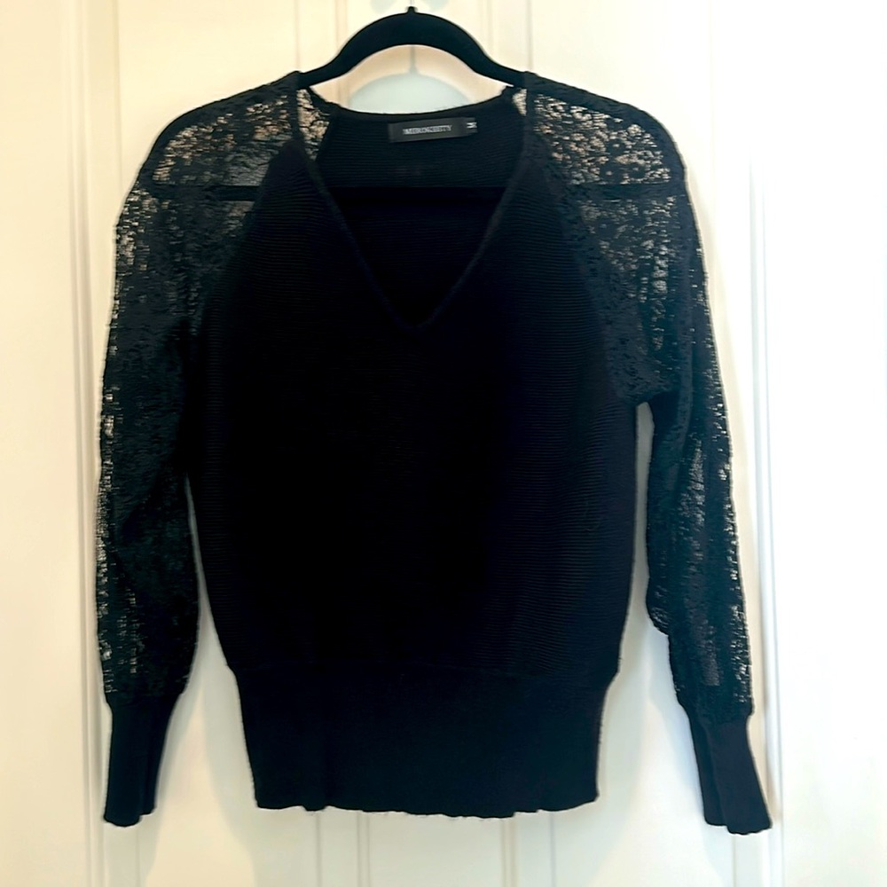 Black sweater, lace sleeves, worn one time. Viscose blend.